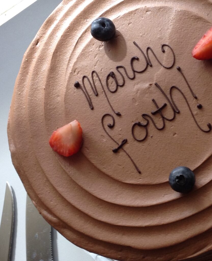 March forth! written on cake.